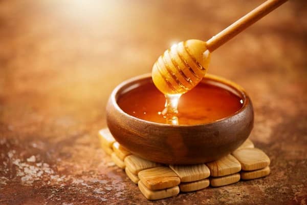 خرید عسل موم دار سیاه + قیمت فروش استثنایی